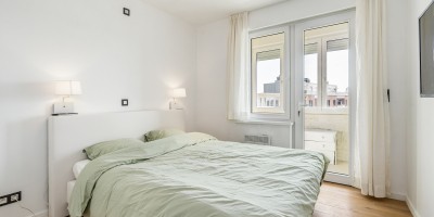 Happ_Dreams_0301_Westende_bad_vakantieverhuur_zijdelings_zeezicht_slaapkamer.jpg