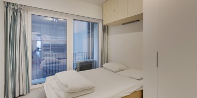 Teniers_0202_Vernieuwd_appartement_1_slaapkamer_frontaal_zeezicht (2).jpg