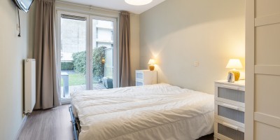 Guapo_Gelijksvloers_tuin_2_slaapkamers_terras_garage_Nestor_de_Tièrestraat_Knokke (9).jpg