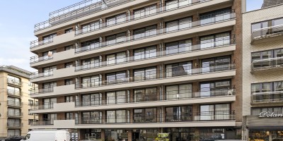 Wellington_C2_Modern_appartement_1_ slaapkamer_streepje zeezicht (16).jpg