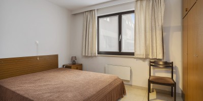 Wellington_C2_Modern_appartement_1_ slaapkamer_streepje zeezicht (10).jpg